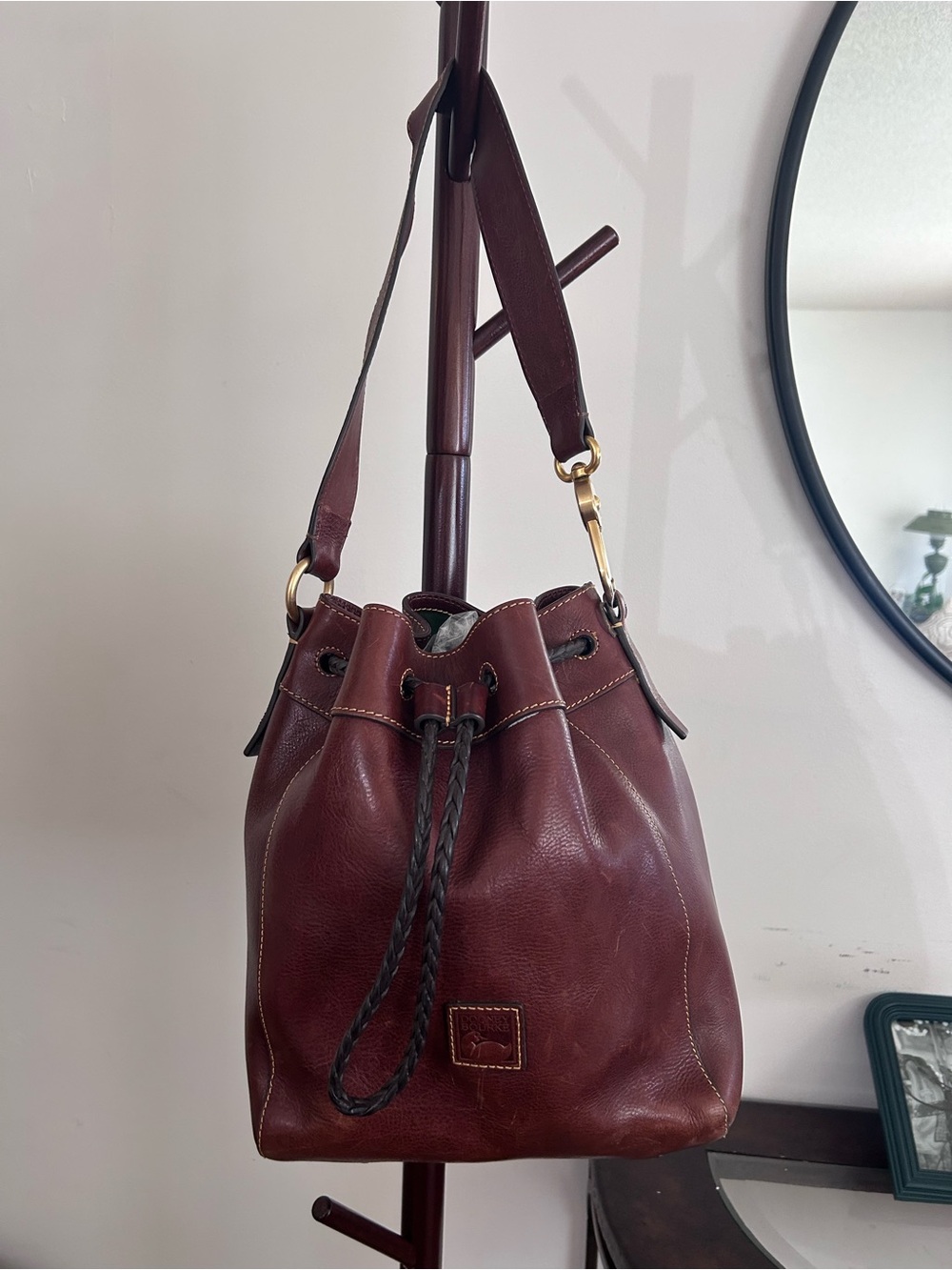 Donney and Brooke Chestnut florentine leather Hattie draw string bucket bag.